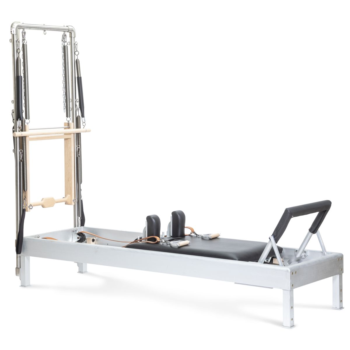 Pilates Tower vs. Reformer: A Side By Side Comparison Pilates Tower vs. Reformer: A Side By Side Comparison