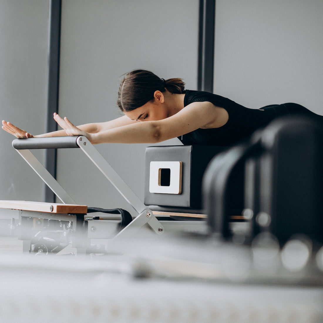 Is Pilates the Secret to Easing Back Pain? – The Pilates Swan