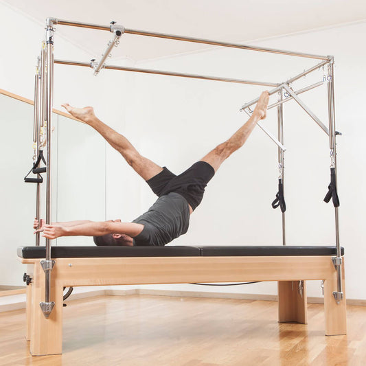 The Pilates Cadillac: The Most Versatile Pilates Training Tool - Pilates Reformers Plus