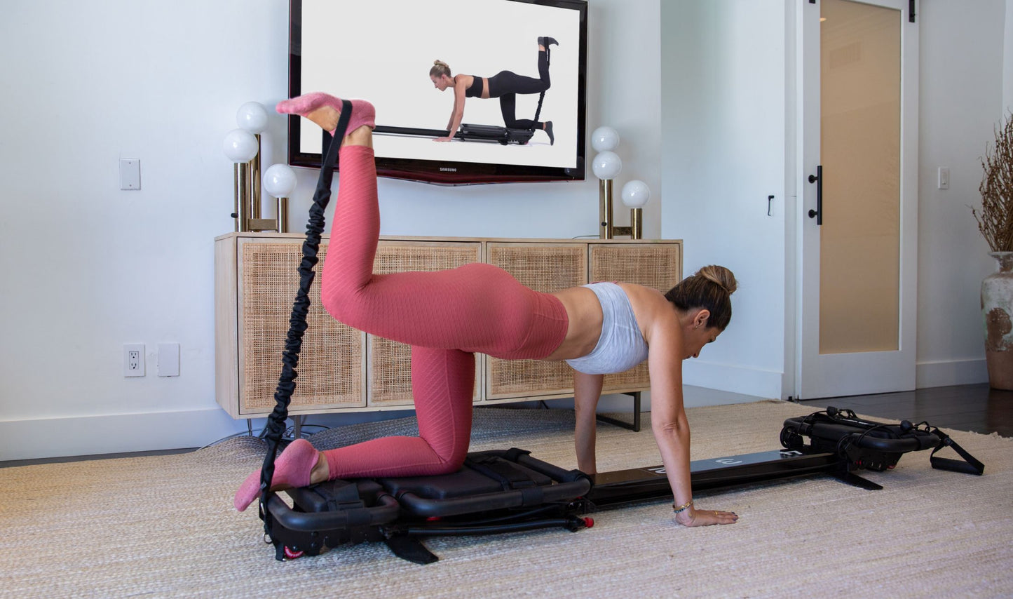 Lagree Micro 4-spring resistance system for progressive intensity